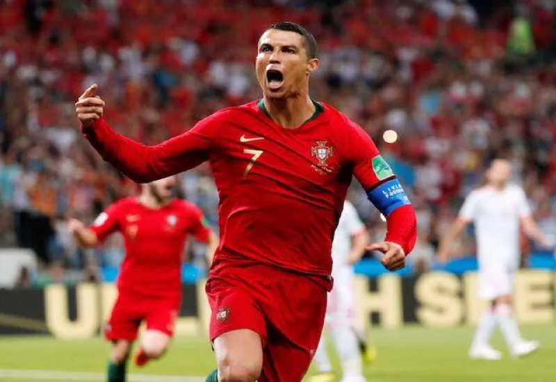 Cristiano Ronaldo celebrating a goal in the Portugal number 7 shirt